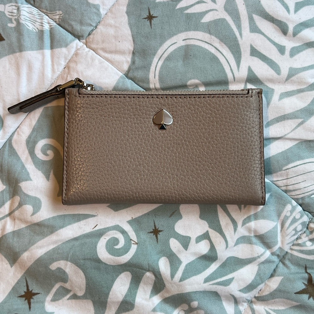Kate Spade beige bifold leather wallet